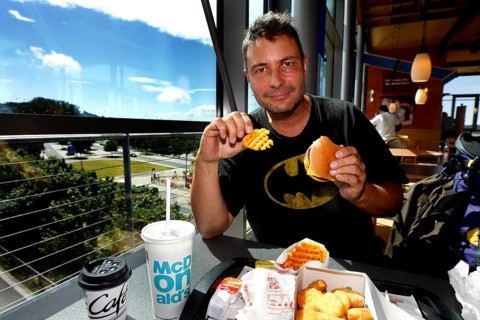 Man eats hamburger