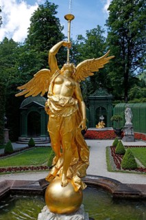 Golden fountain figure of the goddess of fate Fama