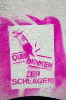 Pink stencil on a house wall