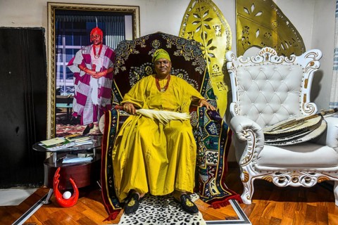 The king of Owo in his throne