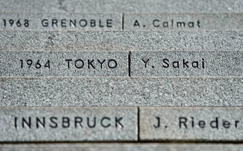 Stairs to the Olympic Museum with the venues of the Olympic Games and the names of the last torchbearer