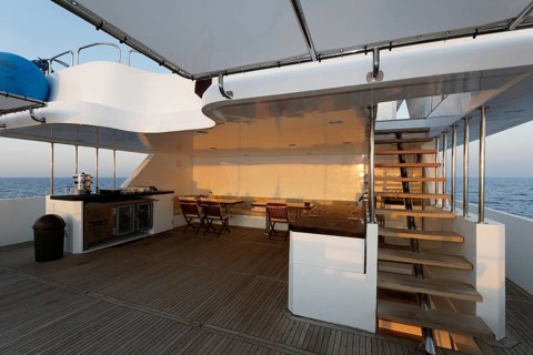 Upper deck with buffet and stairs to the top deck