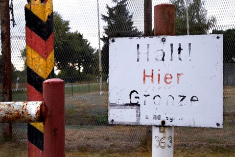 Sign Halt! Here border post post post post post