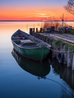 Small fishing harbour on the Peenestrom at sunset