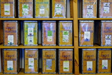 Various teas in tins on shelf