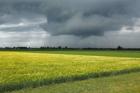 Storm clouds over farmland Province of Quebec