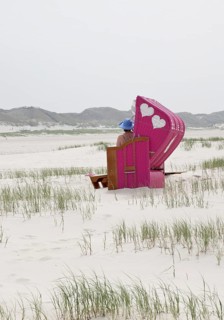 Beach chair with two hearts at the beach