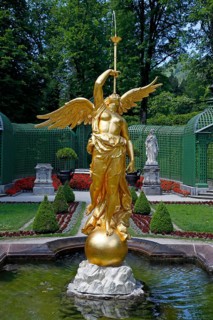 Golden fountain figure of the goddess of fate Fama