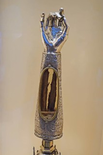 Golden monstrance with forearm bone as relic