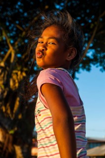 Young girl posing as western actors