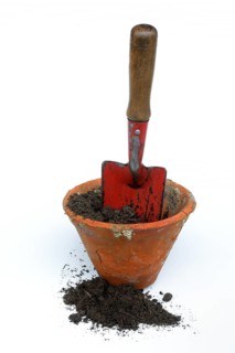 Clay pots and garden shovel