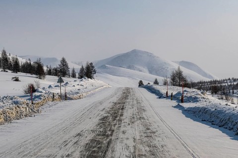 Snow covered mountains along the Road of Bones