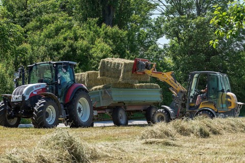 Hay bales being loaded