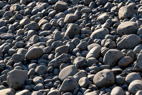 Rounded stones on the beach