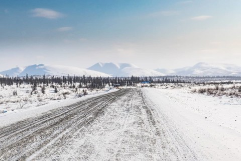 Snow covered mountains along the Road of Bones