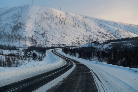 Snow covered mountains along the Road of Bones