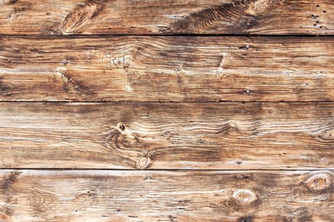 A wall of the old boards. Detail. Mennonites church in village of Palczewo