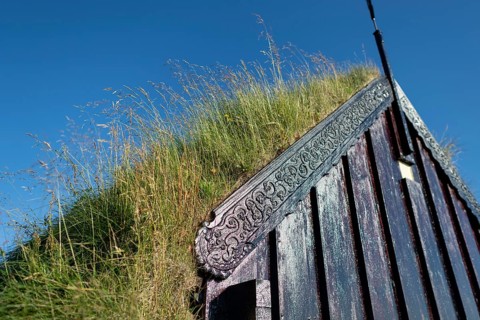 Panel and grass roof decorated with carvings