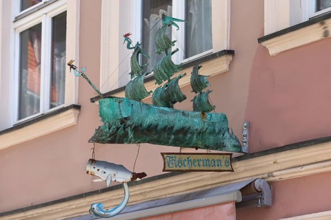 Sailing ship as a nose sign of an inn