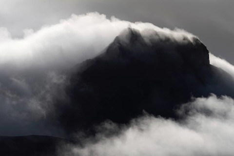 Cloudy craggy mountain
