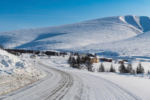 Snow covered mountains along the Road of Bones