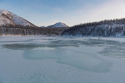 Open water on a frozen lake