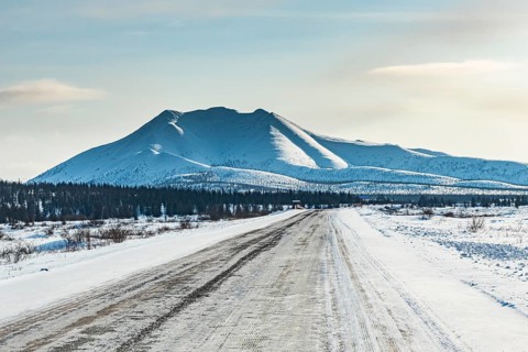 Snow covered mountains along the Road of Bones