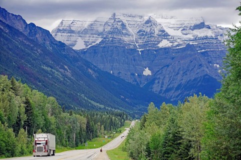 Highway with truck and cyclist
