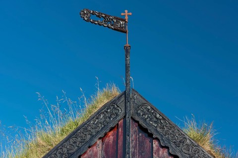 Panel and grass roof decorated with carvings