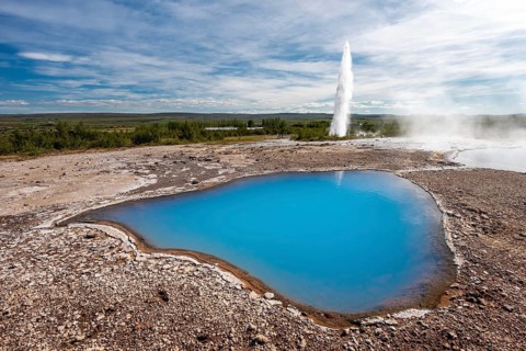 Thermal spring Blesi and eruption Geysir Strokkur