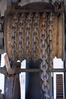 Old chain winch from a historic harbour crane