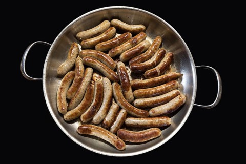 Nuremberg sausages in a frying pan