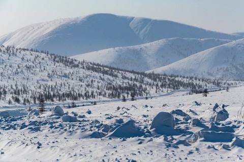 Snow covered mountains along the Road of Bones