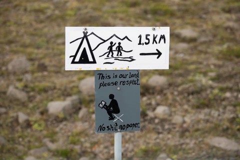 Hand-painted signs Camping and This is our land