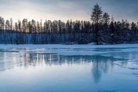 Open water on a frozen lake