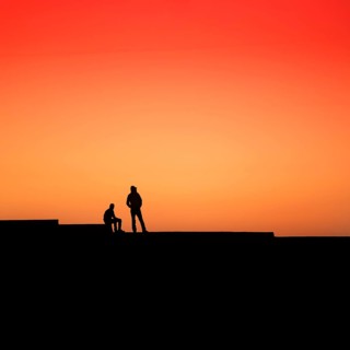 Two men looking into the distance