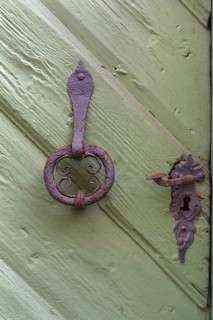 Old door knocker and door handle around 1520