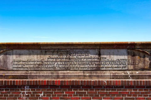 Historical inscription on the base of the old siet gate