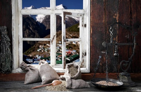 View from the farmer's kitchen with grain sacks and scales into the landscape