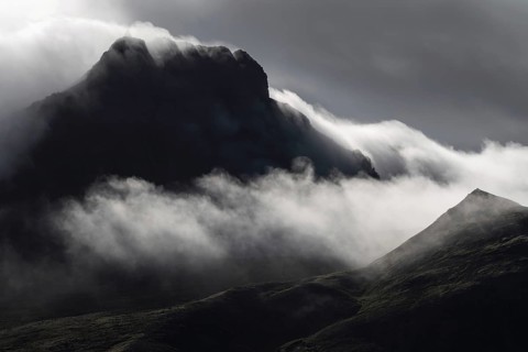 Cloudy craggy mountain