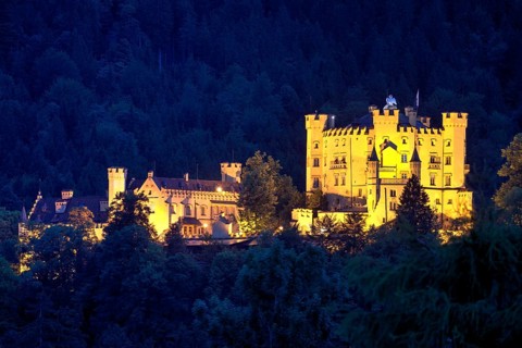Illuminated castle Hohenschwangau at night