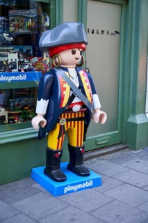 Playmobil pirate in front of toy shop