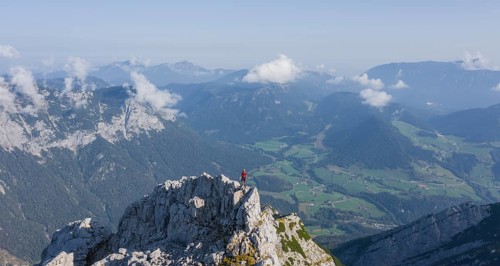 Hiker on a summit on the way to the Hochkalter