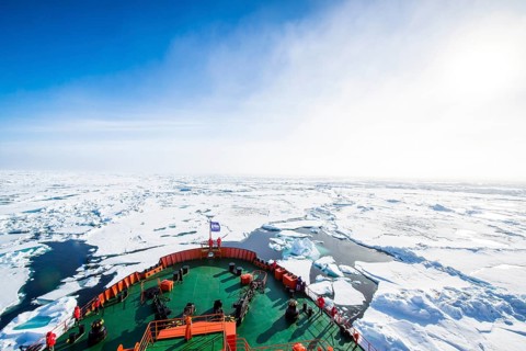 Fog bow or white rainbow in the ice around the North Pole