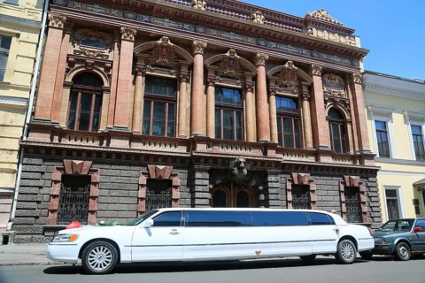 Stretch limousine with wedding decoration in Sabaneiv Most street