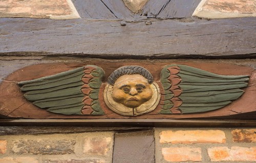 Carved angel figure on the front of the old famous half-timbered house 'Angel house' or 'Hans Raffns house' build 1573 in Ystad