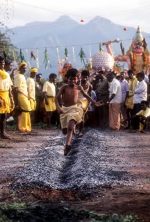 A boy running on burning coal