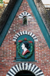 Bust of a woman with laurel wreath