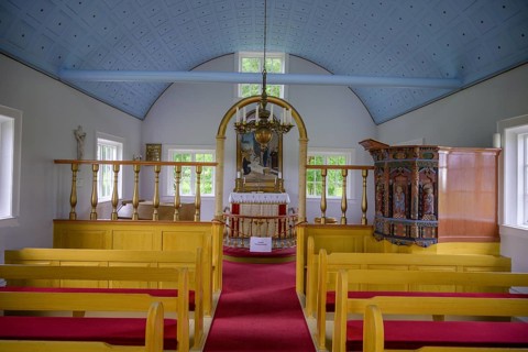 Church interior view looking towards the altar and pulpit