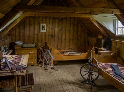 Bedroom with spinning wheel